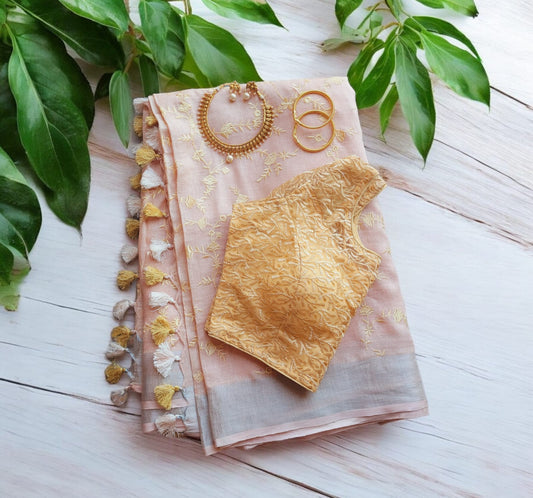Linen Saree with Stitched net Embroidered Blouse